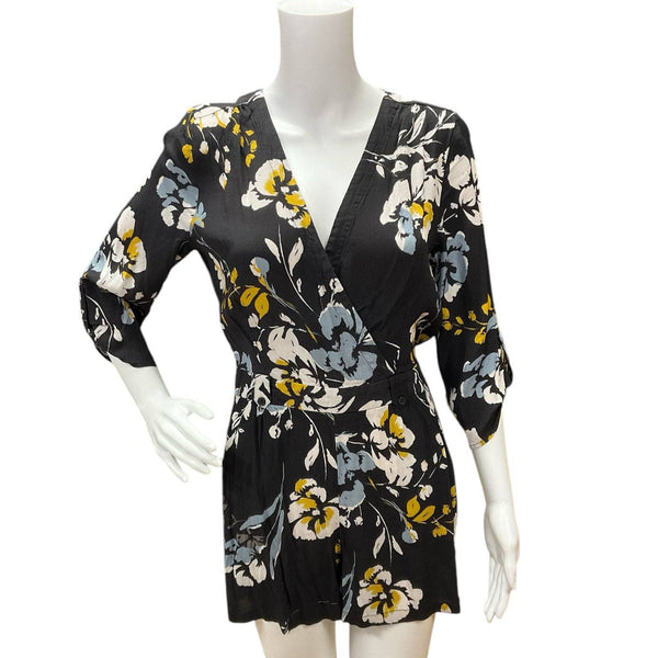 Front view of Yumi Kim Romper Size Medium with V-neckline and floral pattern, available at Margaret’s Fine Consignments.