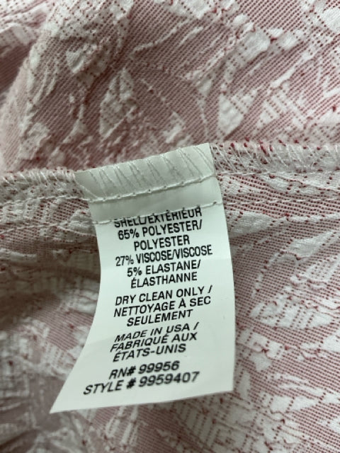 Close-up of fabric tag on Shoshanna Pink/White Floral Pre-Owned Ladies Dress Size 6 detailing material composition and care instructions.