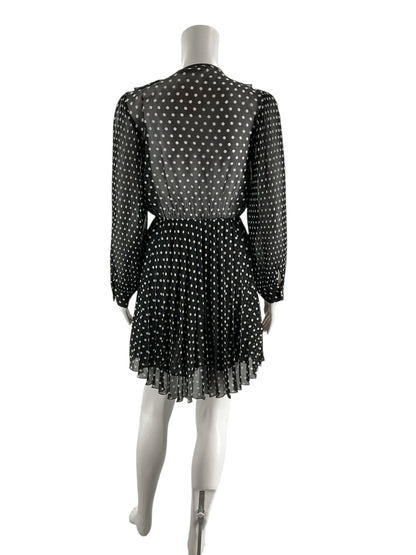 Black and white Zara mini dress with A-line cut and Peter Pan collar, vintage-inspired style, size XS.