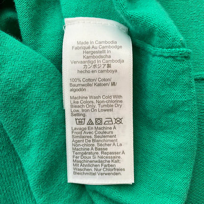 J Crew green solid pre-owned ladies top in size medium, featuring a classic design and soft fabric.