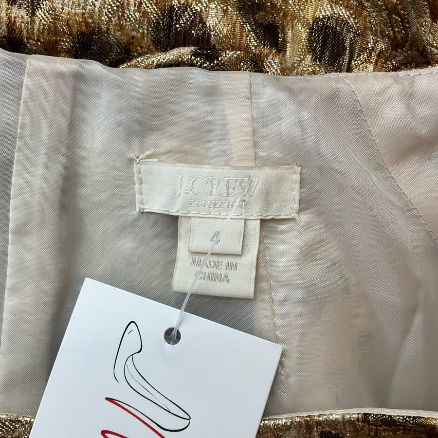 J Crew gold animal print ladies dress in size 4, showcasing a stylish design and vibrant patterns.