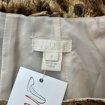 J Crew gold animal print ladies dress in size 4, showcasing a stylish design and vibrant patterns.