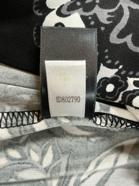 Internal tag displaying product ID802790 for White House Black Market black and white floral paisley sheath dress, size medium.