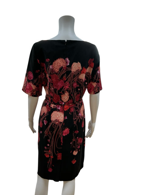 Back view of Adrianna Papell Black/Pink Floral Pre-Owned Ladies Dress - Size 8 showing floral print continuation and concealed zipper closure.