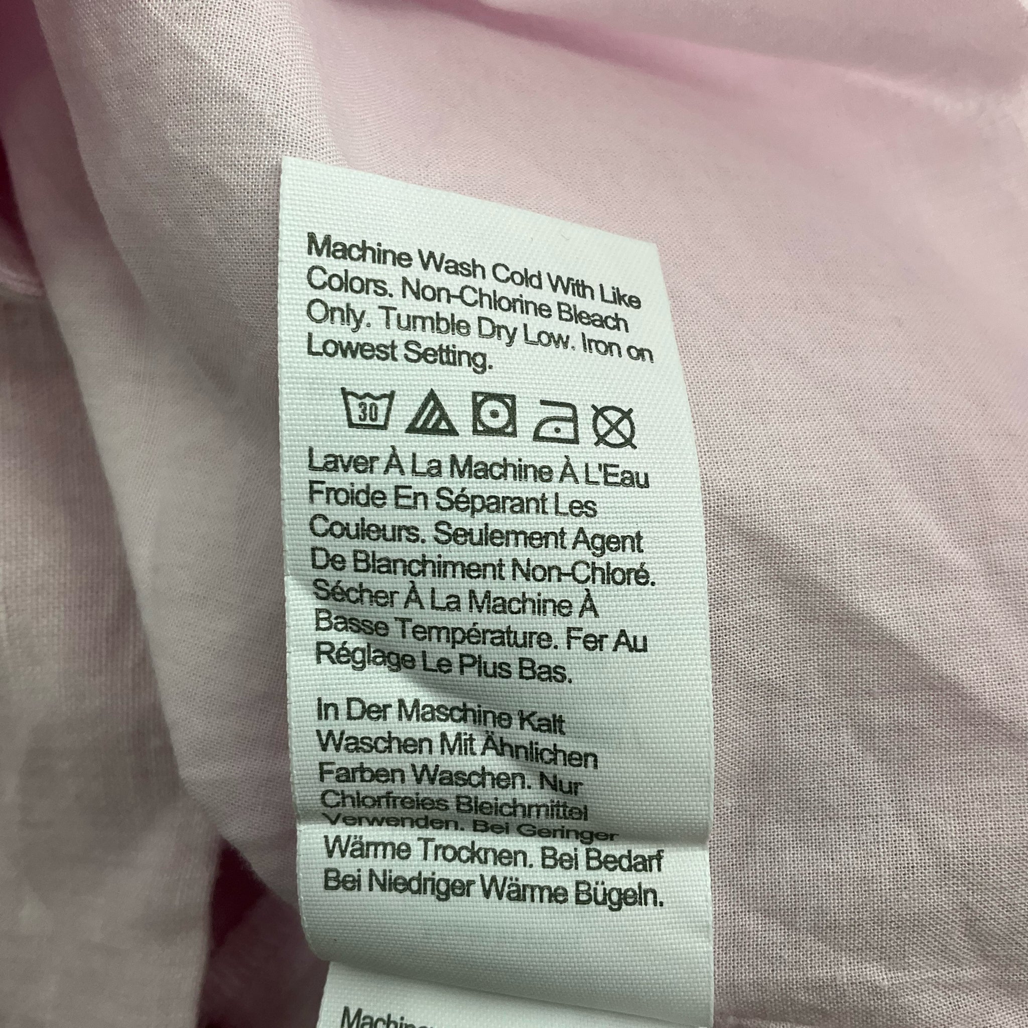Care label on J Crew Lavender Solid Dress - Size XXS with washing instructions for maintaining linen fabric quality.