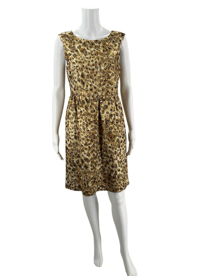 J Crew gold animal print ladies dress, size 4, featuring a stylish design and flattering silhouette.