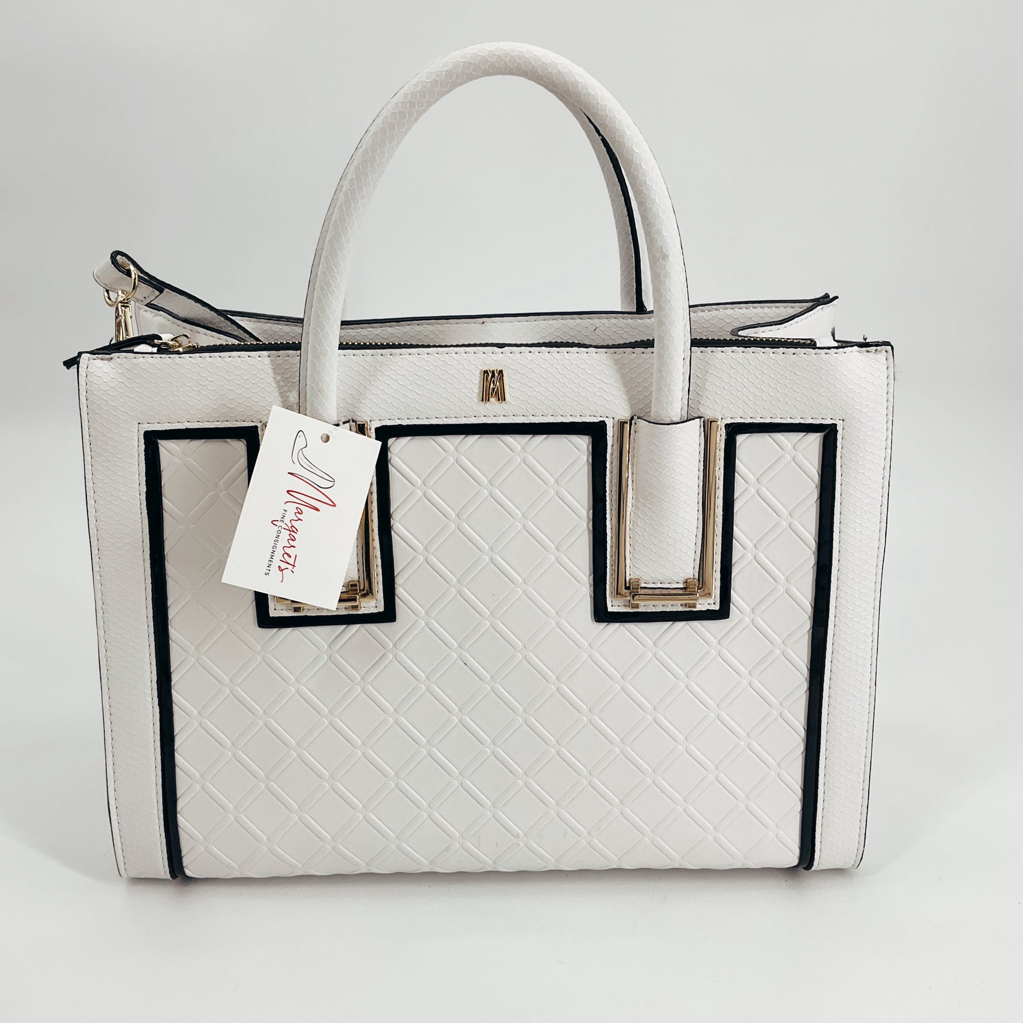 Antonio Melani Tote Bag - Textured White with black trim and gold accents, featuring dual handles and quilted front panel. Stylish and spacious purse.