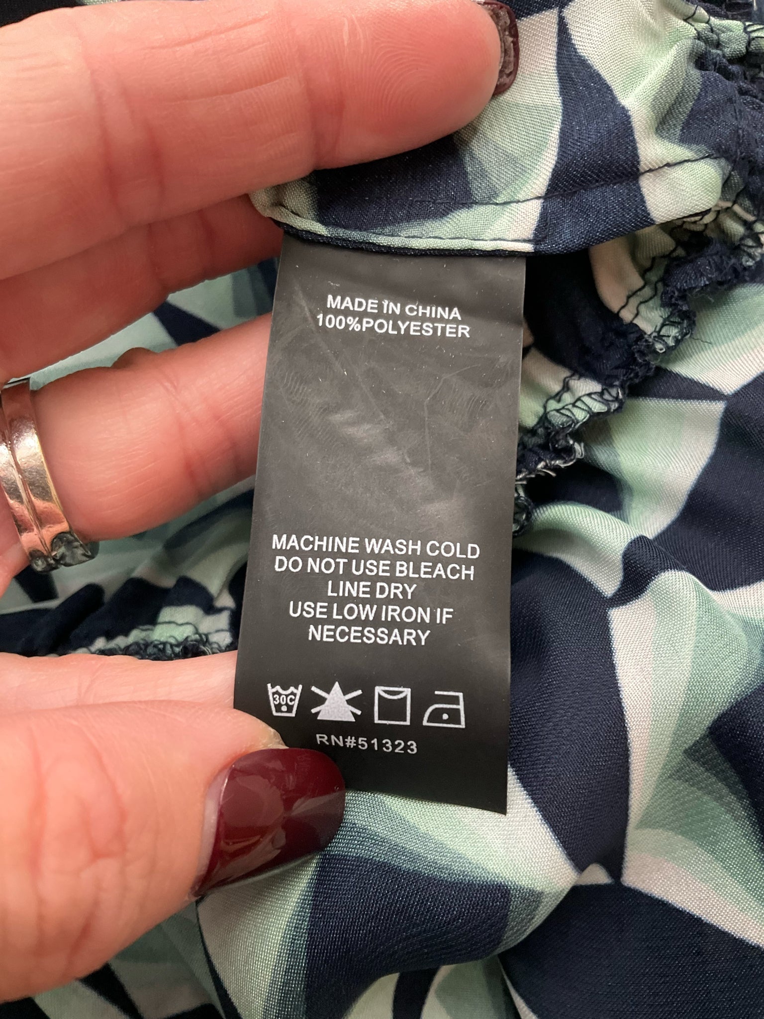 Vince Camuto navy and mint green print off-the-shoulder peplum blouse with balloon sleeves, size large.