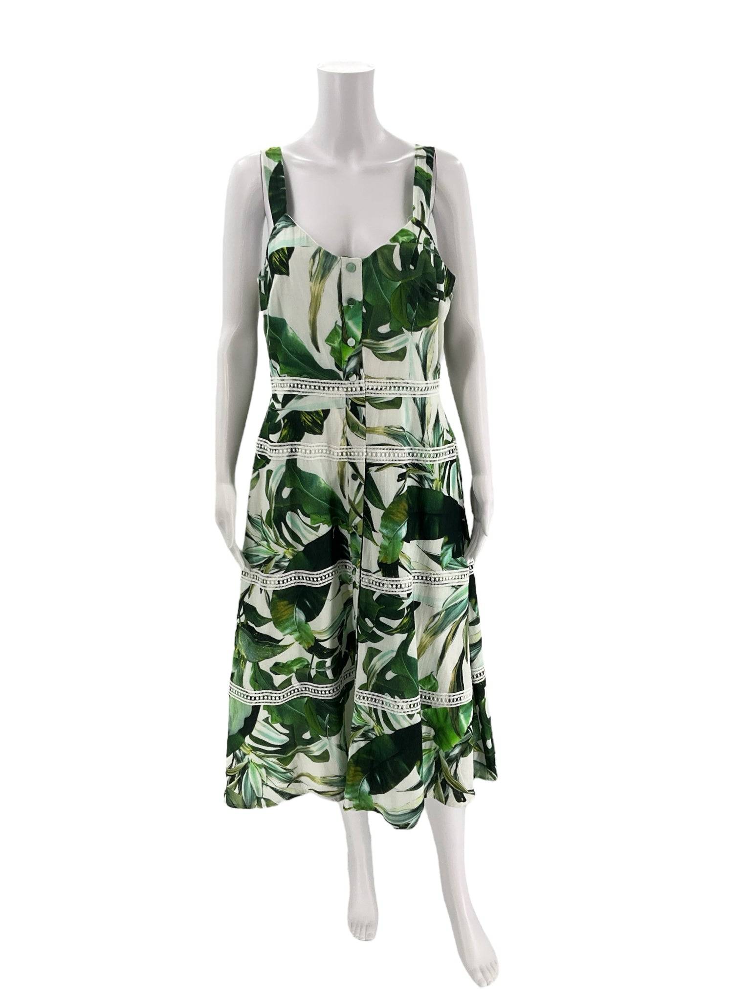 Front view of Gianni Bini Scoop Neck Maxi Dress Size 8 with white and green leaf print, available at Margaret’s Fine Consignments.