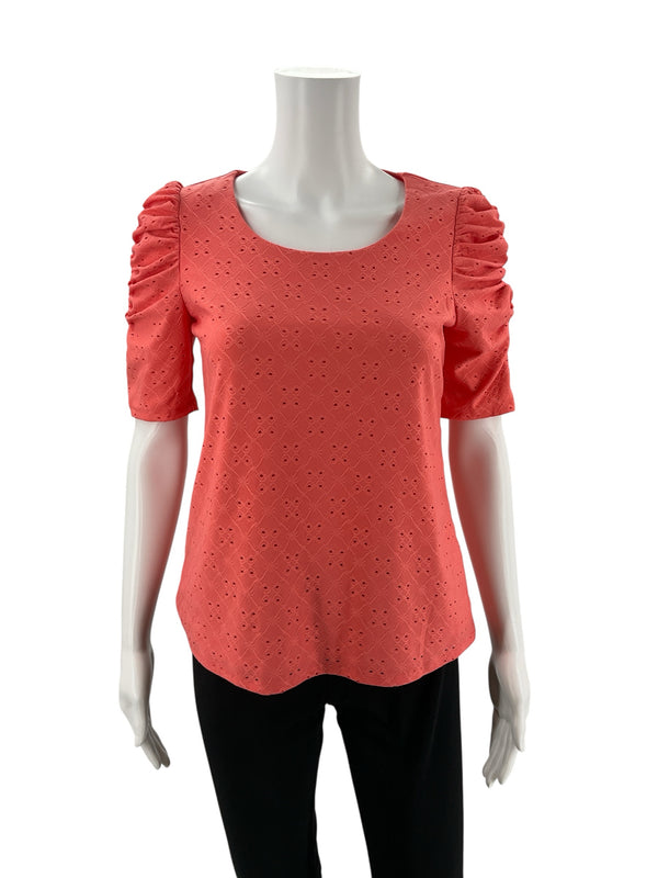CeCe Coral Pre-Owned Ladies Top - Size XS displayed on mannequin, featuring eyelet knit fabric and romantic puff sleeves.