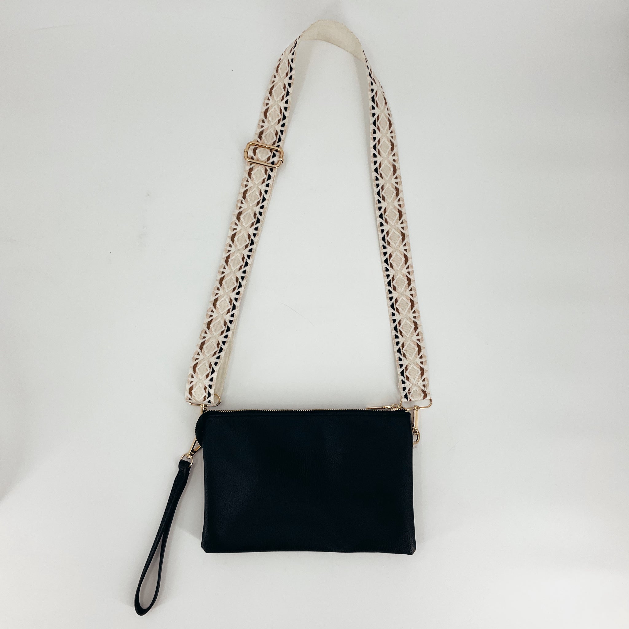 Jen & Co Black Solid Pre-Owned Purse with detachable white woven shoulder strap, available at Margaret's Fine Consignments. Stylish and versatile design.