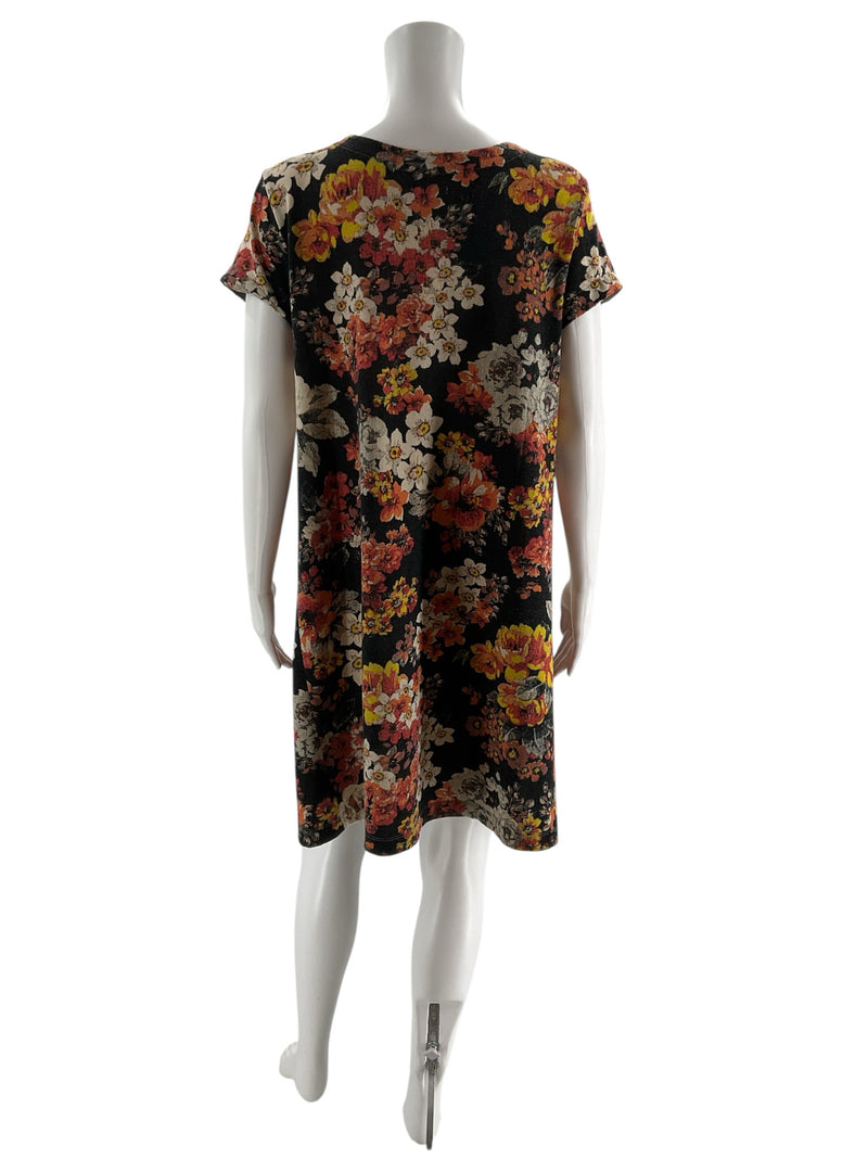 Back view of Kimchi Blue Black/Cream/Red Floral Pre-Owned Ladies Dress - Size Large, highlighting flowy swing cut and vintage-inspired floral design.