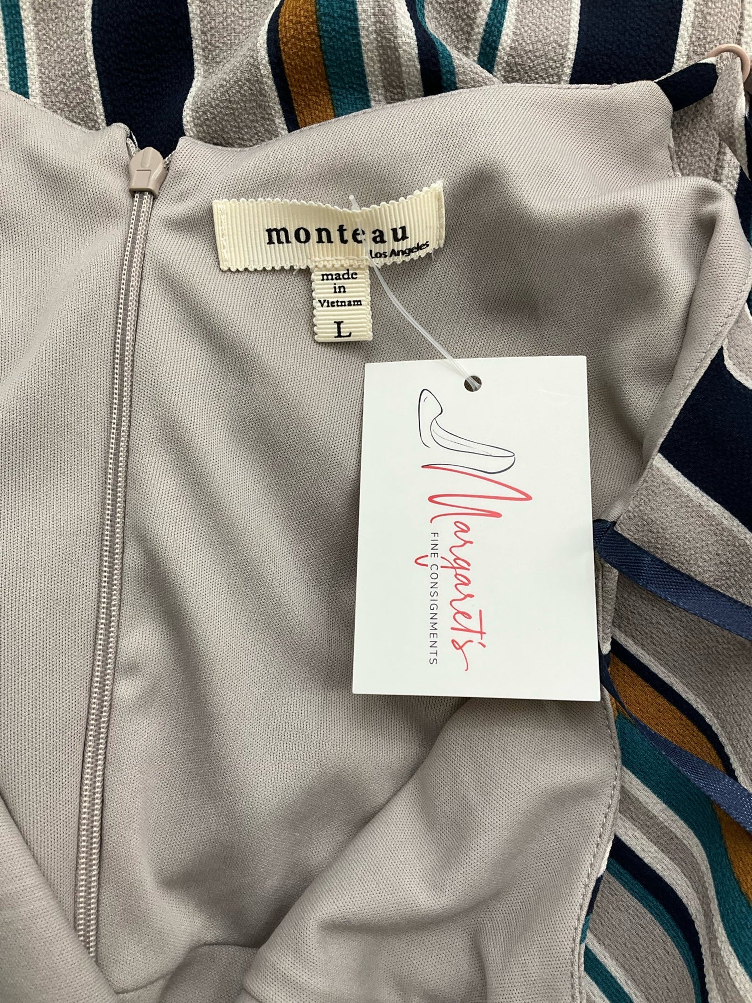 Pre-owned Monteau wide leg jumpsuit in gray, navy, and mustard stripes, featuring a V-neck and sleeveless design. Size large.