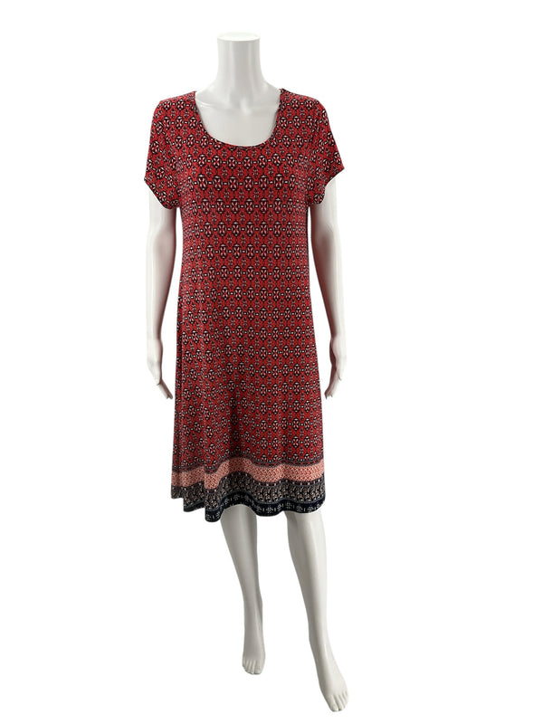 Western Connection orange navy A-line midi dress size L displayed on mannequin, featuring pullover style and medallion border print for resort-ready looks.