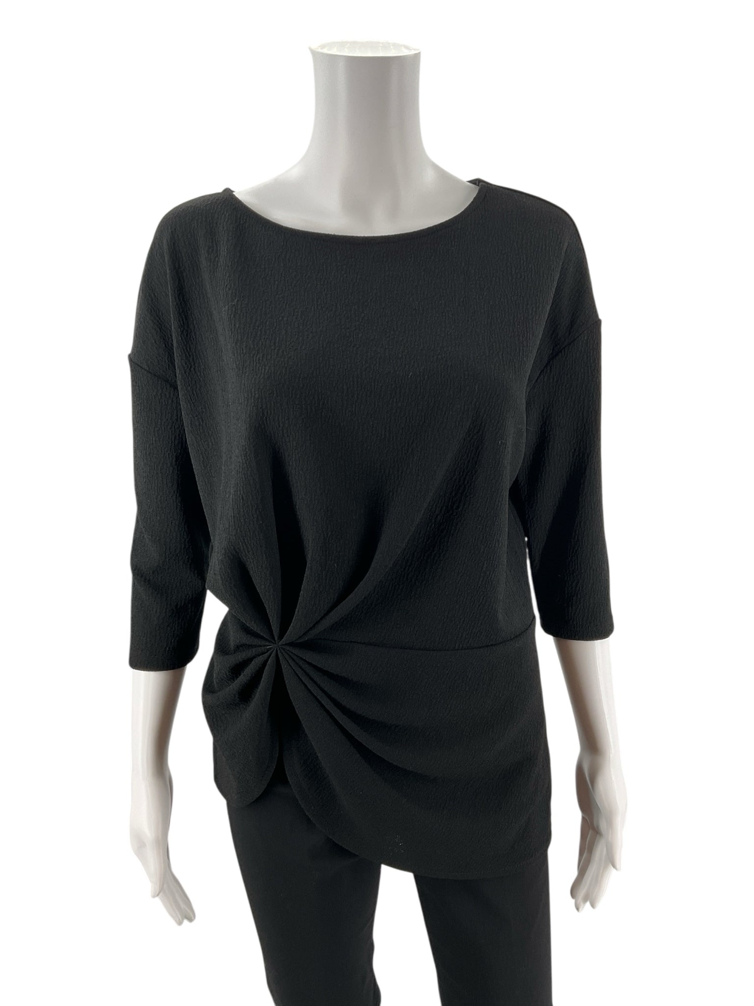Vince Camuto black boat neck top with twist front, drop shoulder, and asymmetrical design, size small.
