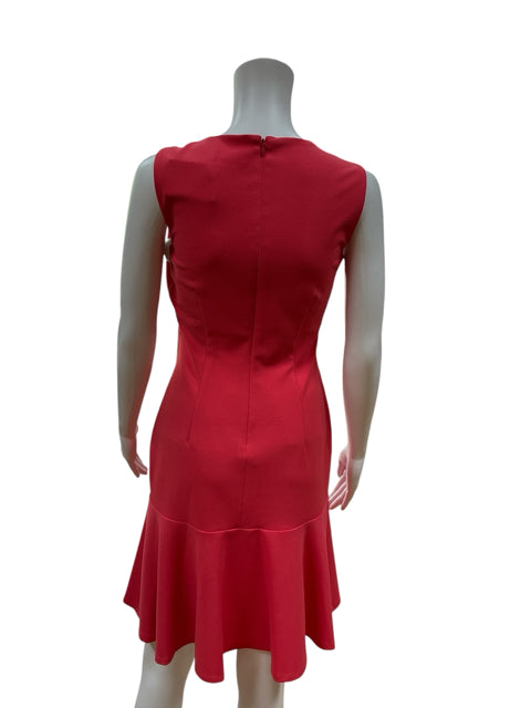 Back view of Calvin Klein Coral Pre-Owned Ladies Dress - Size 2 on mannequin, highlighting zip closure and tailored fit for special occasions.