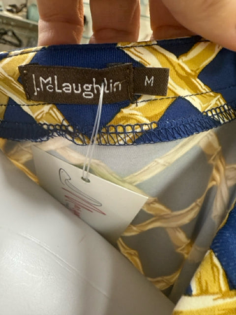 Brand tag of Jj Mclaughlin Blue/Gold Print Pre-Owned Ladies Dress showing size medium and original designer label.