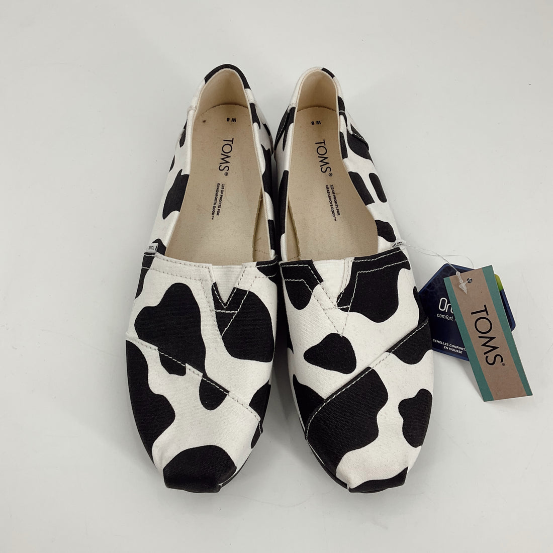 Toms White/Black Cow Pre-Owned Ladies New With Tags Slip On - Size 8 - Margaret’s Fine Consignment