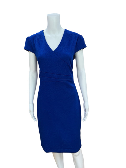 Pre-owned HOMEYBEE royal blue bodycon dress on mannequin, showcasing textured fabric and flattering faux wrap design for business casual wear.