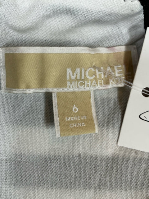 Brand and size tag of Michael Kors Black/White Stripe Dress. Displays 'Michael Michael Kors' label and size 6 made in China.