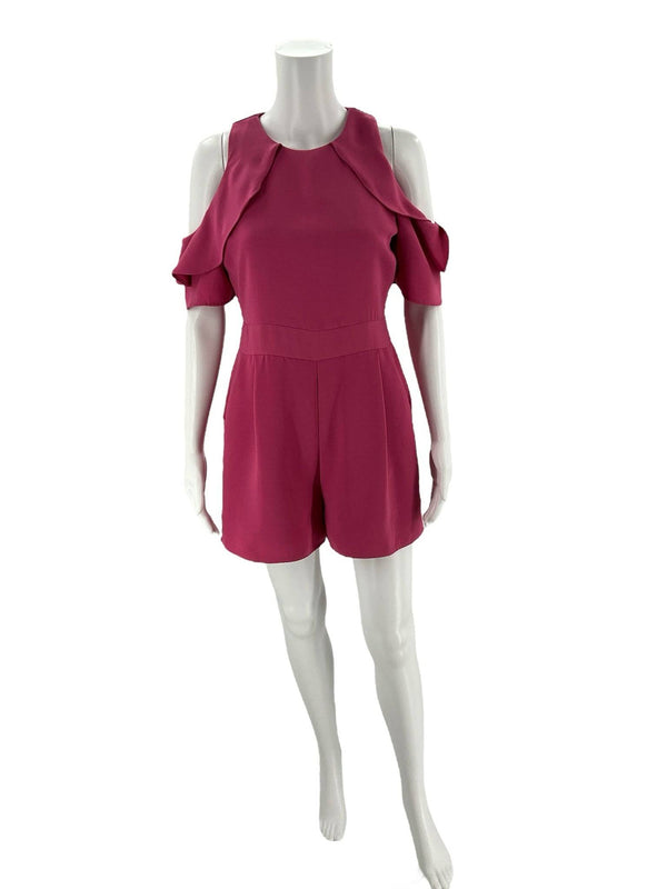 Front view of Miami Romper Size Small in vibrant pink with ruffle sleeves and tailored fit. Shop this pre-loved style at Margaret’s Fine Consignments.