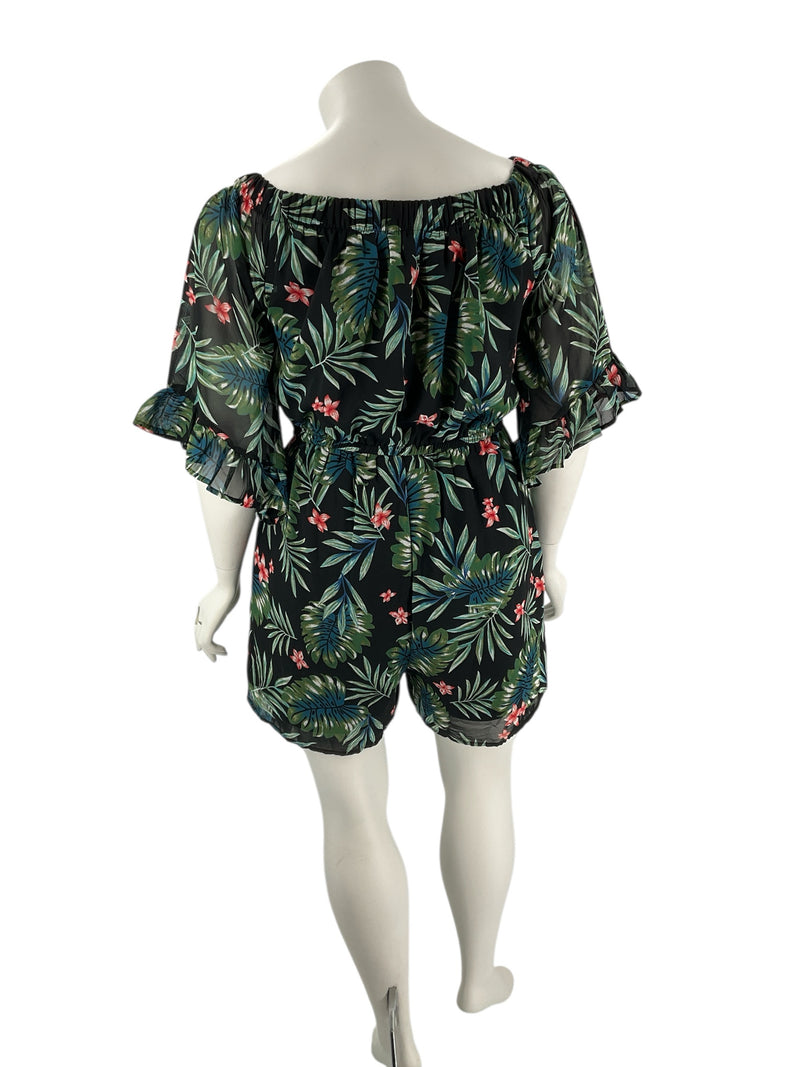 Back view of Indulge Leaf Print Pre-Owned Romper - Size 1X showing elastic waist and flowy fit in tropical leaf pattern for plus-size casual wear.