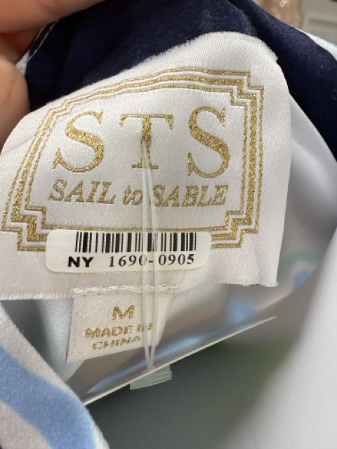 Brand tag of Sail to Sable STS dress with size Medium and product code NY 1690-0905, indicating pre-owned status and origin.