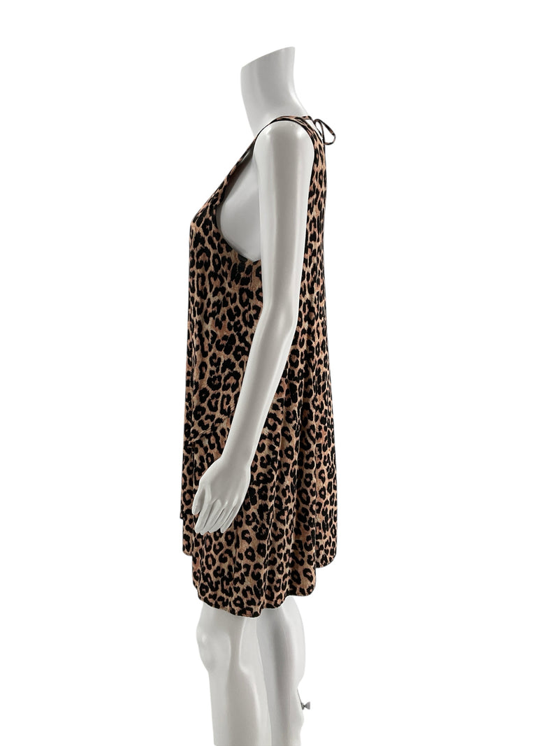 Side profile of Blue Rain Brown/Black Print Pre-Owned Ladies Dress highlighting flowy A-line silhouette and lightweight rayon fabric.