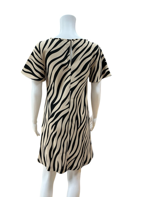 Back view of Ann Taylor size 0 animal print dress showing keyhole back detail and short sleeves, ideal for casual or workwear.