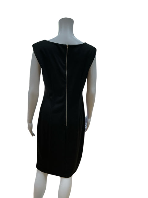 Back view of London Times size 10 colorblock sheath dress featuring a sleek black finish and exposed zipper, perfect for professional or evening wear.