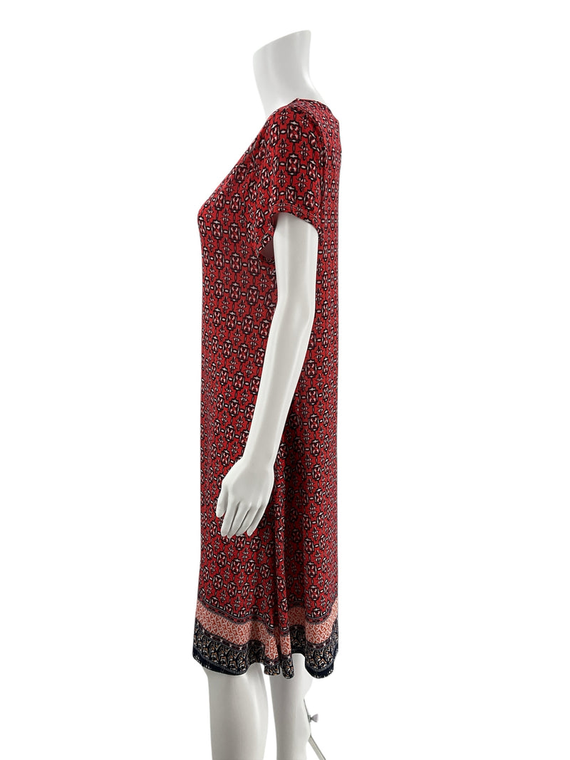 Side profile of Western Connection orange navy A-line midi dress size L, showcasing relaxed fit and lightweight jersey knit fabric for travel comfort.