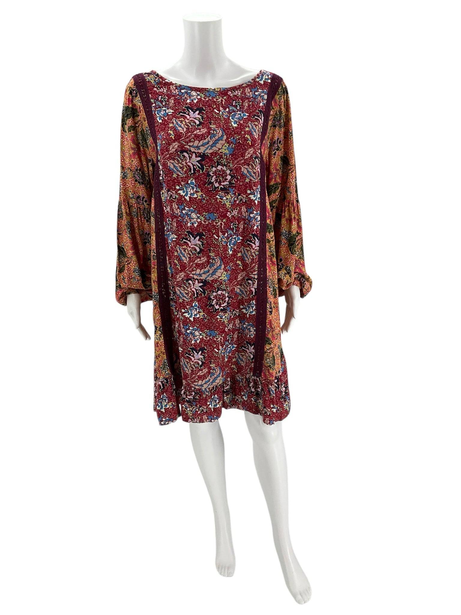 Front view of Matilda Jane maroon floral mini dress, size medium, featuring long sleeves and boat neckline. Shop at Margaret’s Fine Consignments.