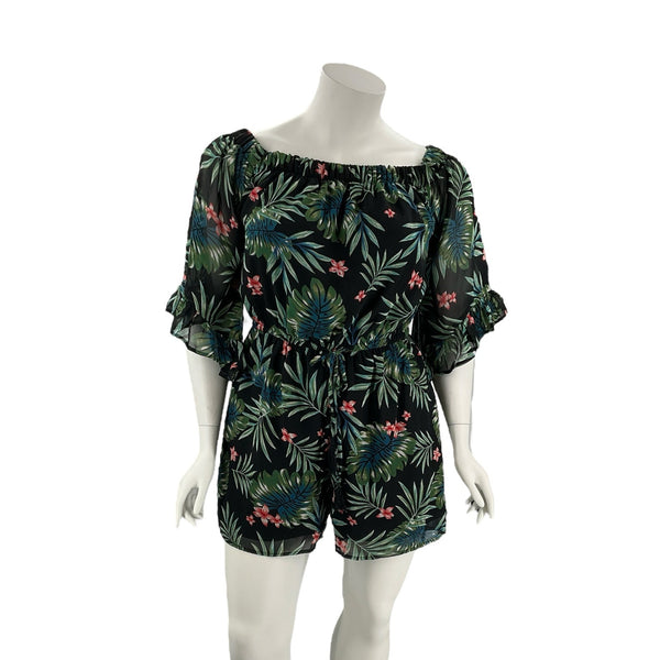 Indulge Leaf Print Pre-Owned Romper - Size 1X with black base and green, blue, and pink tropical leaves, featuring ruffled sleeves and elastic neckline.