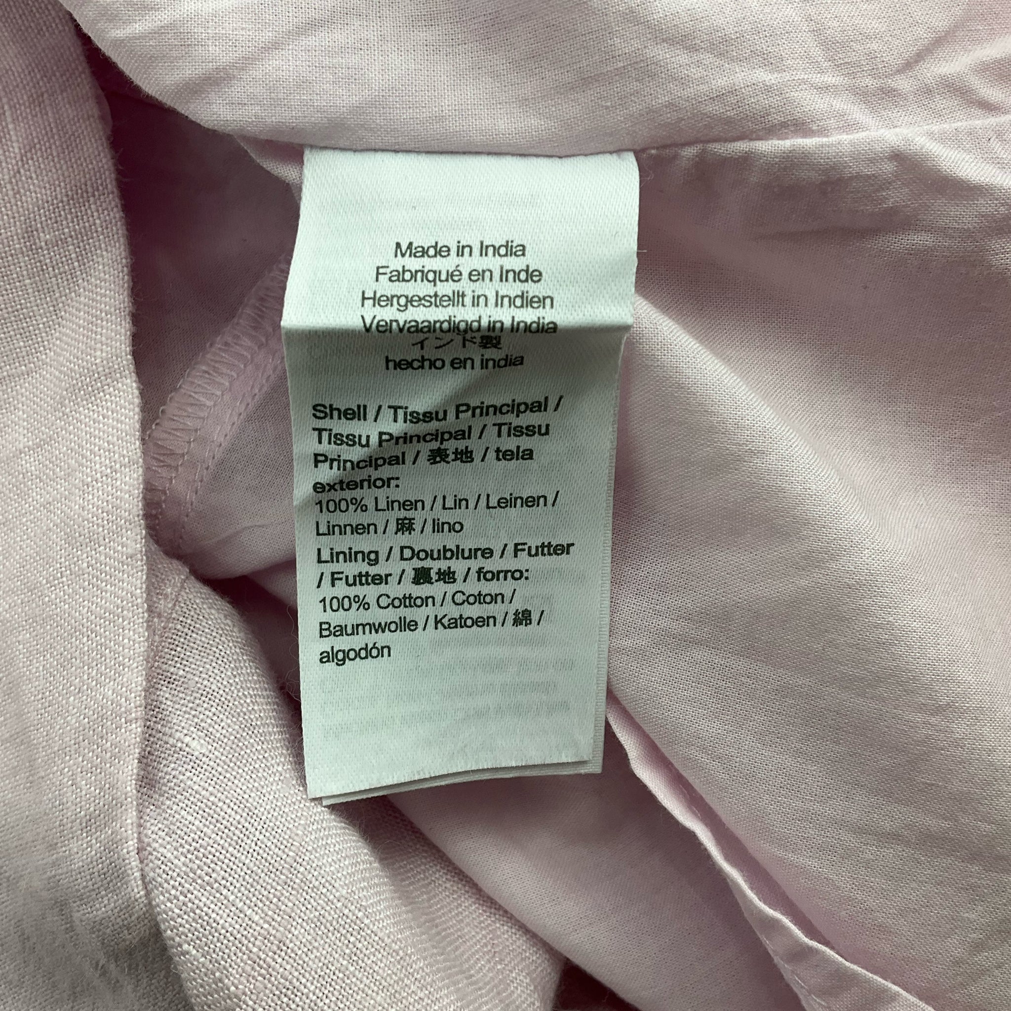 Fabric tag of J Crew Lavender Solid Dress - Size XXS showing 100% linen shell and cotton lining for breathable comfort.