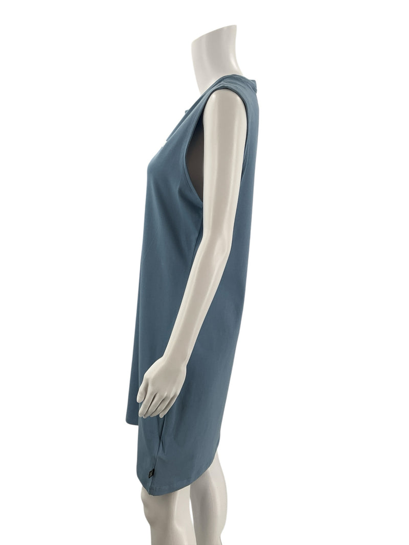 Side profile of Puma Essentials Blue Teal Tank Dress on mannequin, highlighting the straight cut and breathable cotton-elastane fabric.