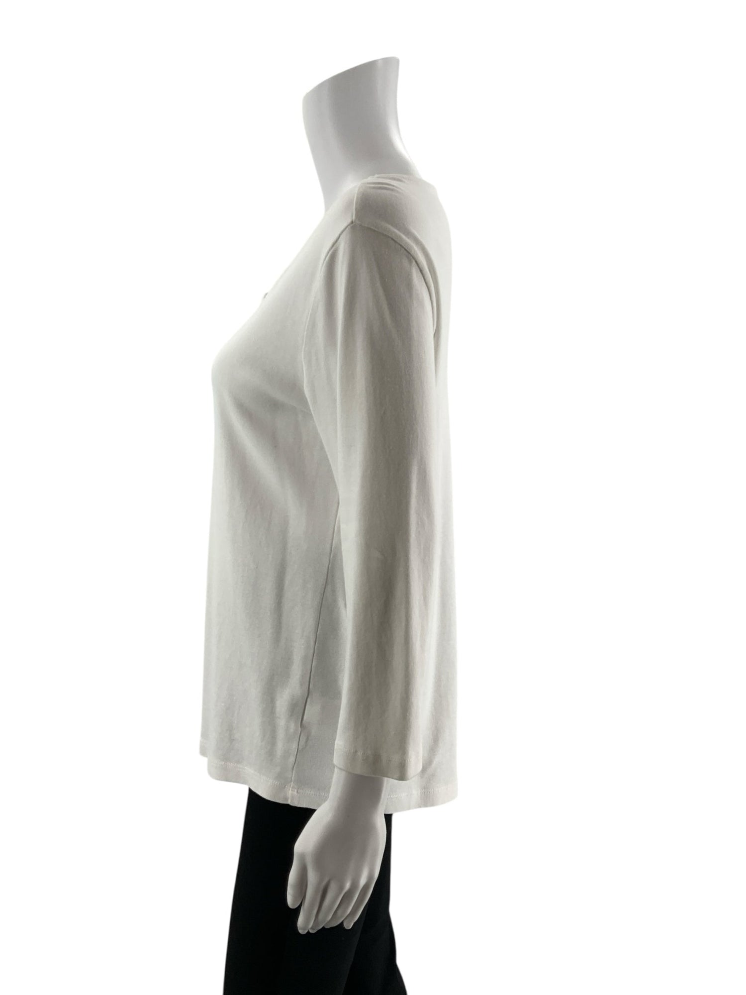 White solid A-line top for women in size medium by Karen Scott, featuring a casual and minimalist design.
