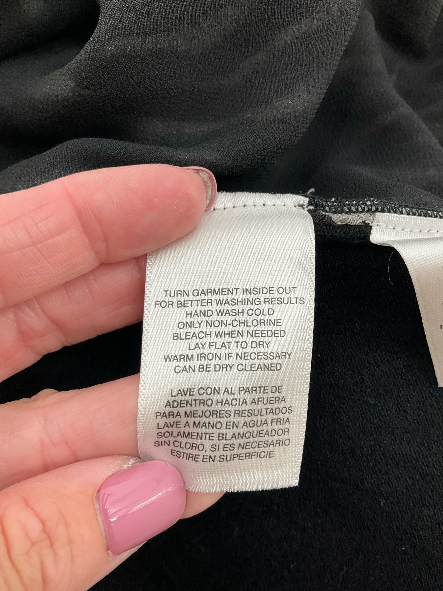 Jones New York gray and black animal print sleeveless blouse with knit back, size large petite, perfect for business casual wear.