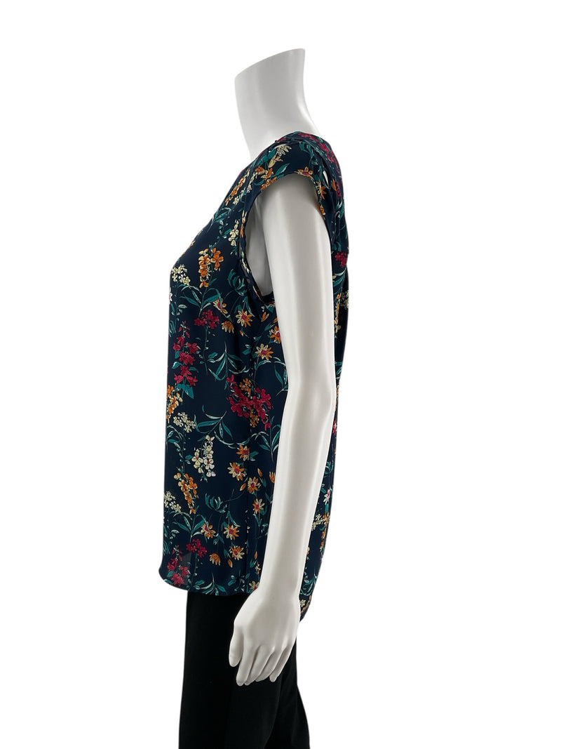 Side profile of Daniel Rainn Floral Crochet Trim Sleeveless Blouse Top Size Small highlighting relaxed fit and sleeveless cut for versatile styling.