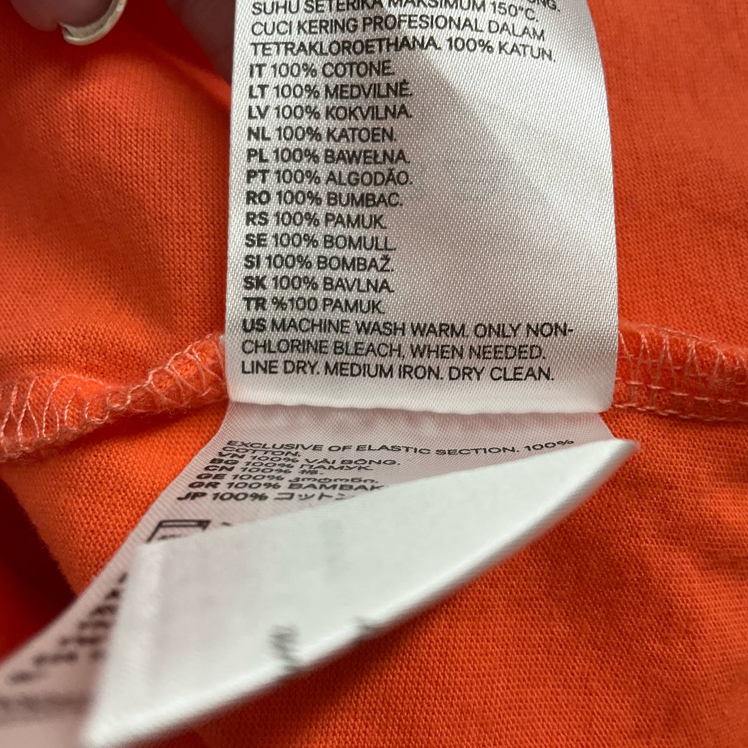 H&amp;M orange cold shoulder top for women, size large, featuring a solid design and stylish cut.