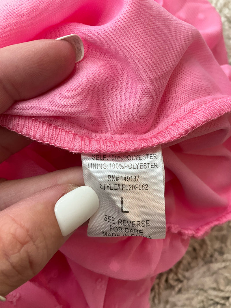 Fabric content tag of Favlux Pink Textured Pre-Owned Ladies Dress Size Large showing 100% polyester shell and lining with style code FL20F062.