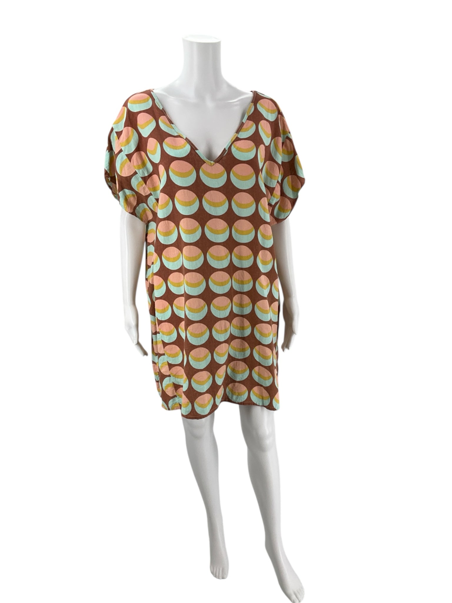 Becasa Rust/Multi Circles Print Dress in size XS with V-neck and relaxed fit, displayed on mannequin front view. Pre-owned casual mini dress.