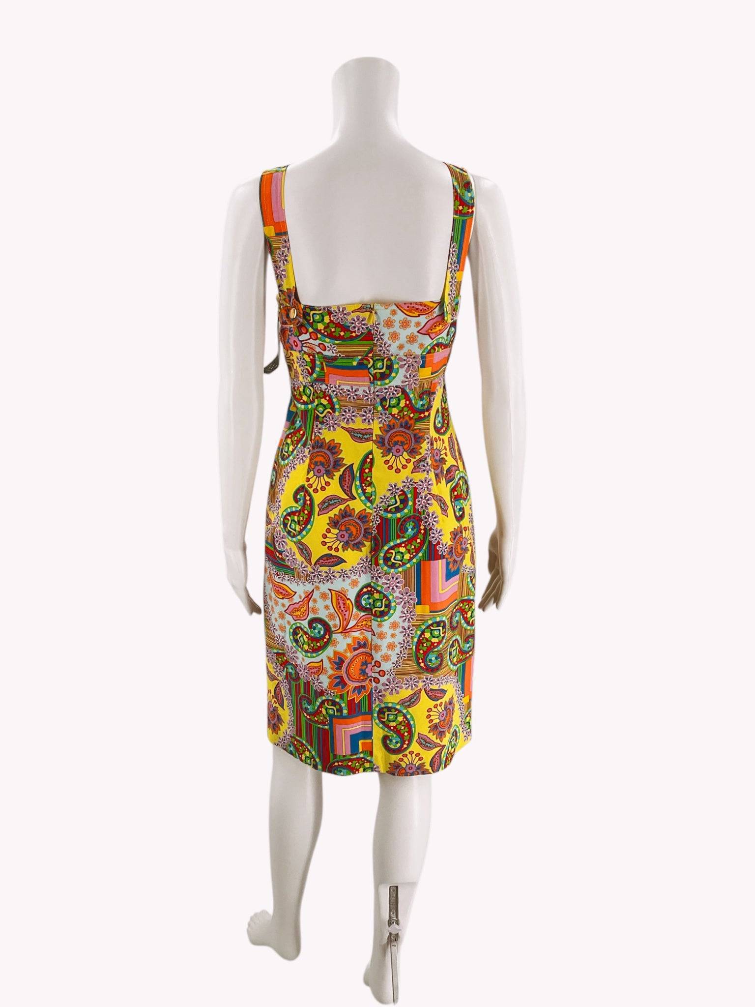 Back view of David Meister sleeveless rainbow print dress size 10 on mannequin, showcasing bold colorful pattern at Margaret’s Fine Consignments.