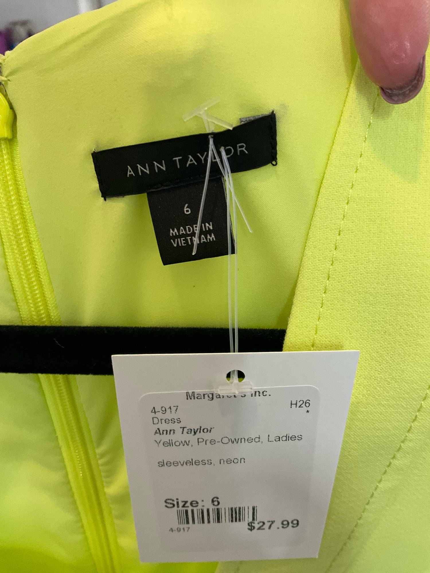 Sleeveless yellow Ann Taylor sheath dress, knee-length, size 6, ideal for career or cocktail events.