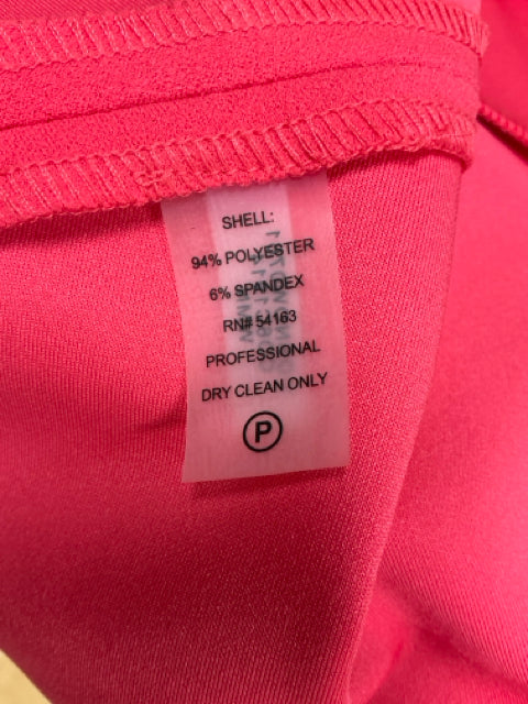 Close-up of fabric care label on Calvin Klein Coral Pre-Owned Ladies Dress - Size 2, showing 94% polyester, 6% spandex, dry clean only.