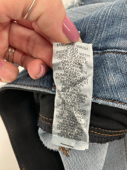 Democracy high-rise blue denim shorts size 8, featuring a classic cut-off design and frayed hem details.