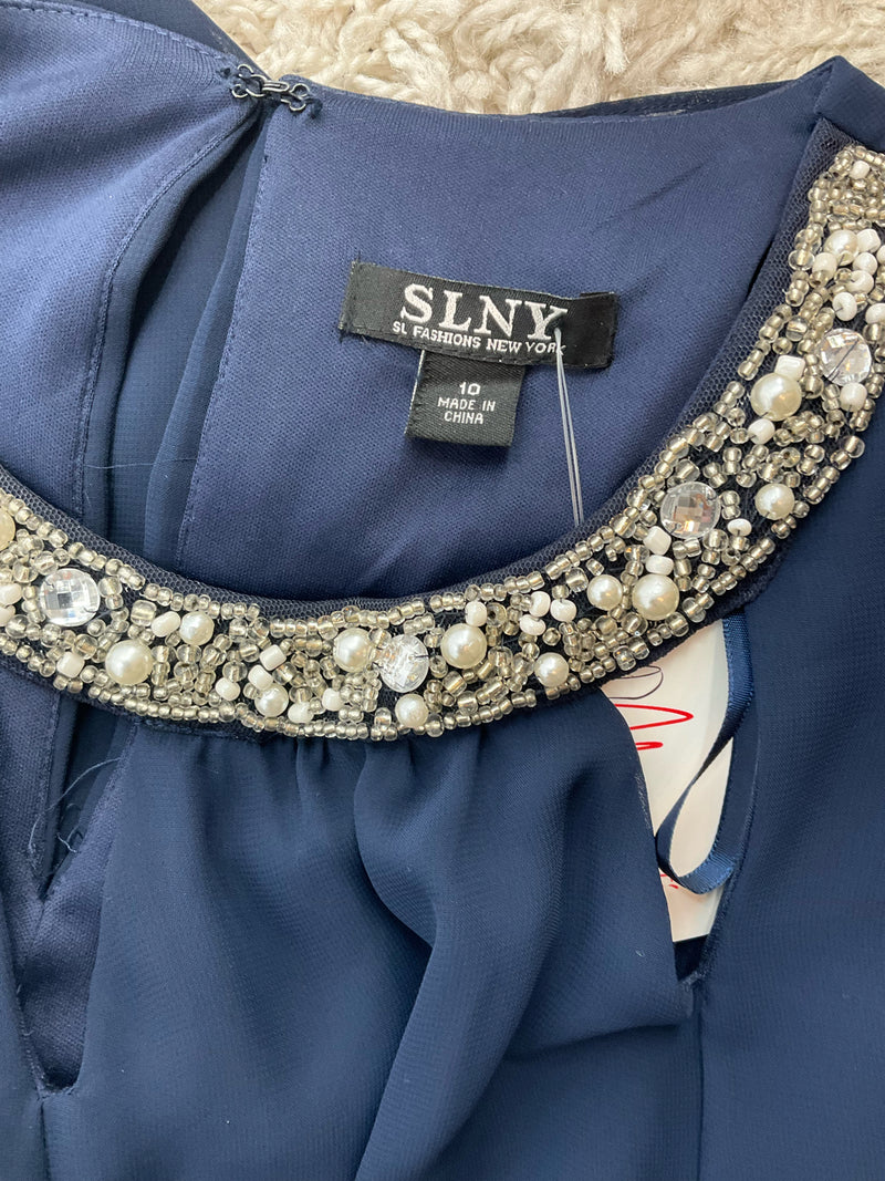Close-up of SLNY dress neckline with pearl and rhinestone embellishments, highlighting the formal detailing on this size 10 dress.