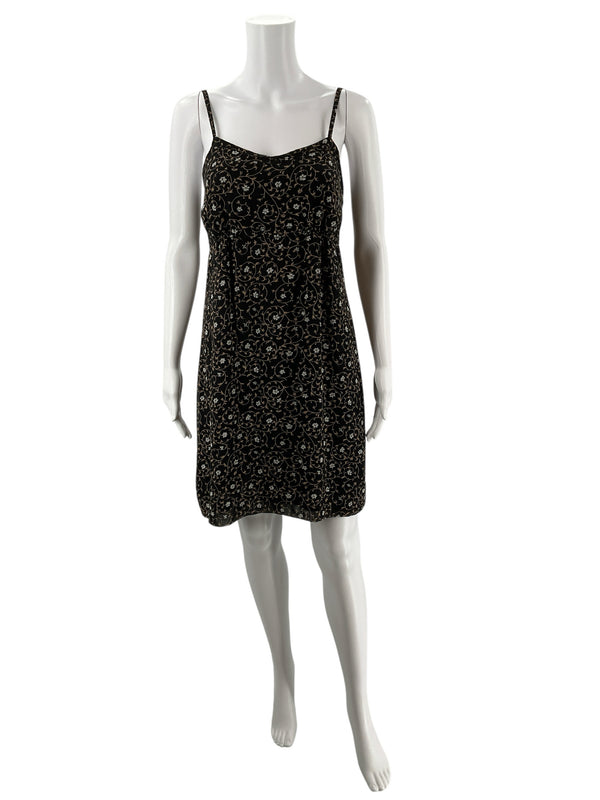 Pre-owned Express black and taupe floral midi slip dress on mannequin, featuring Y2K style, sheath silhouette, and spaghetti straps.