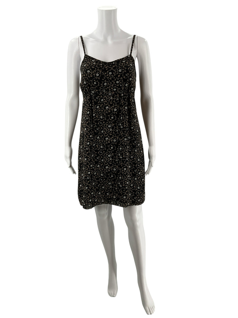 Pre-owned Express black and taupe floral midi slip dress on mannequin, featuring Y2K style, sheath silhouette, and spaghetti straps.