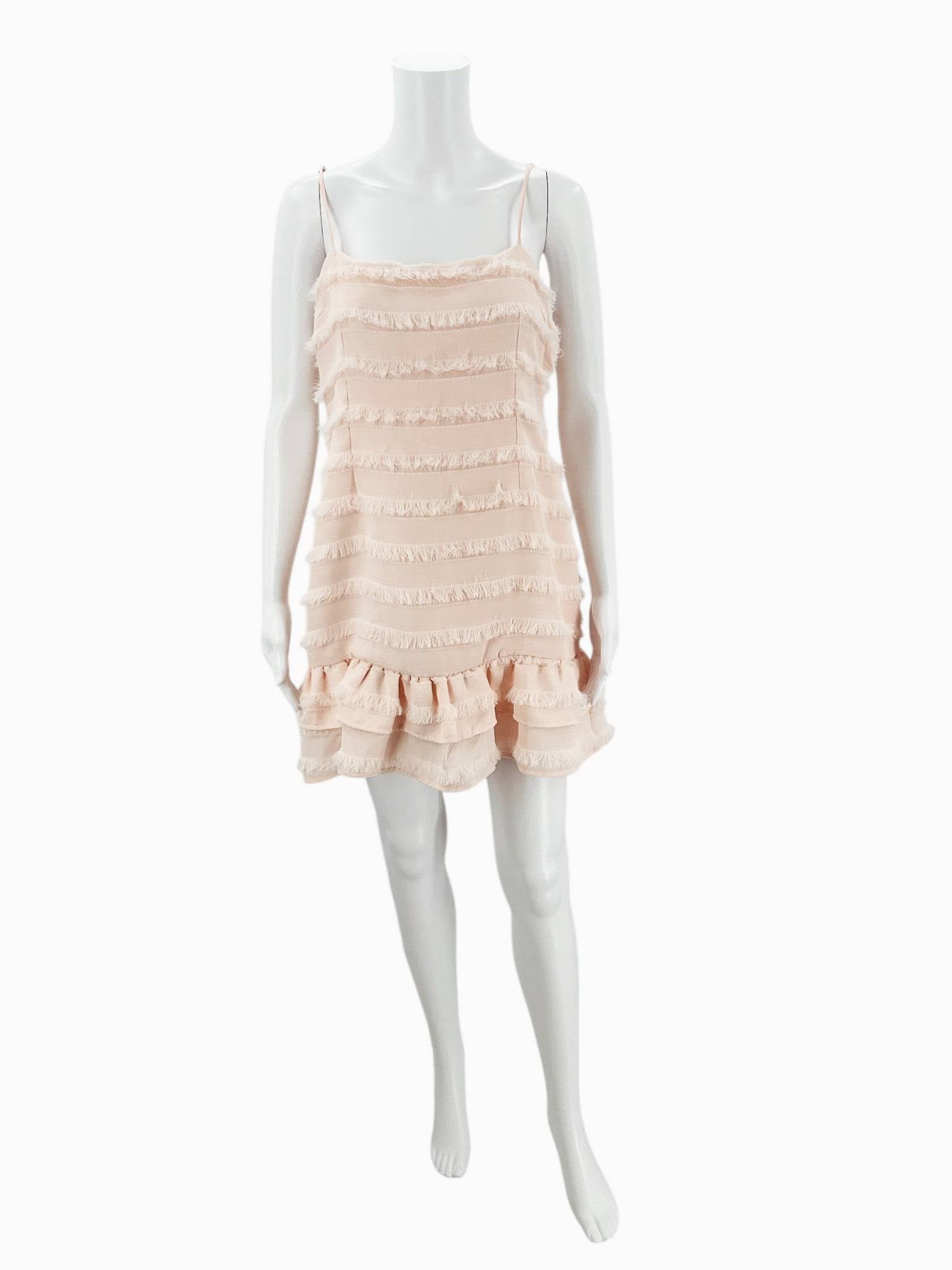 Princess Polly blush fringe spaghetti strap mini dress size 12, front view, available at Margaret’s Fine Consignments.