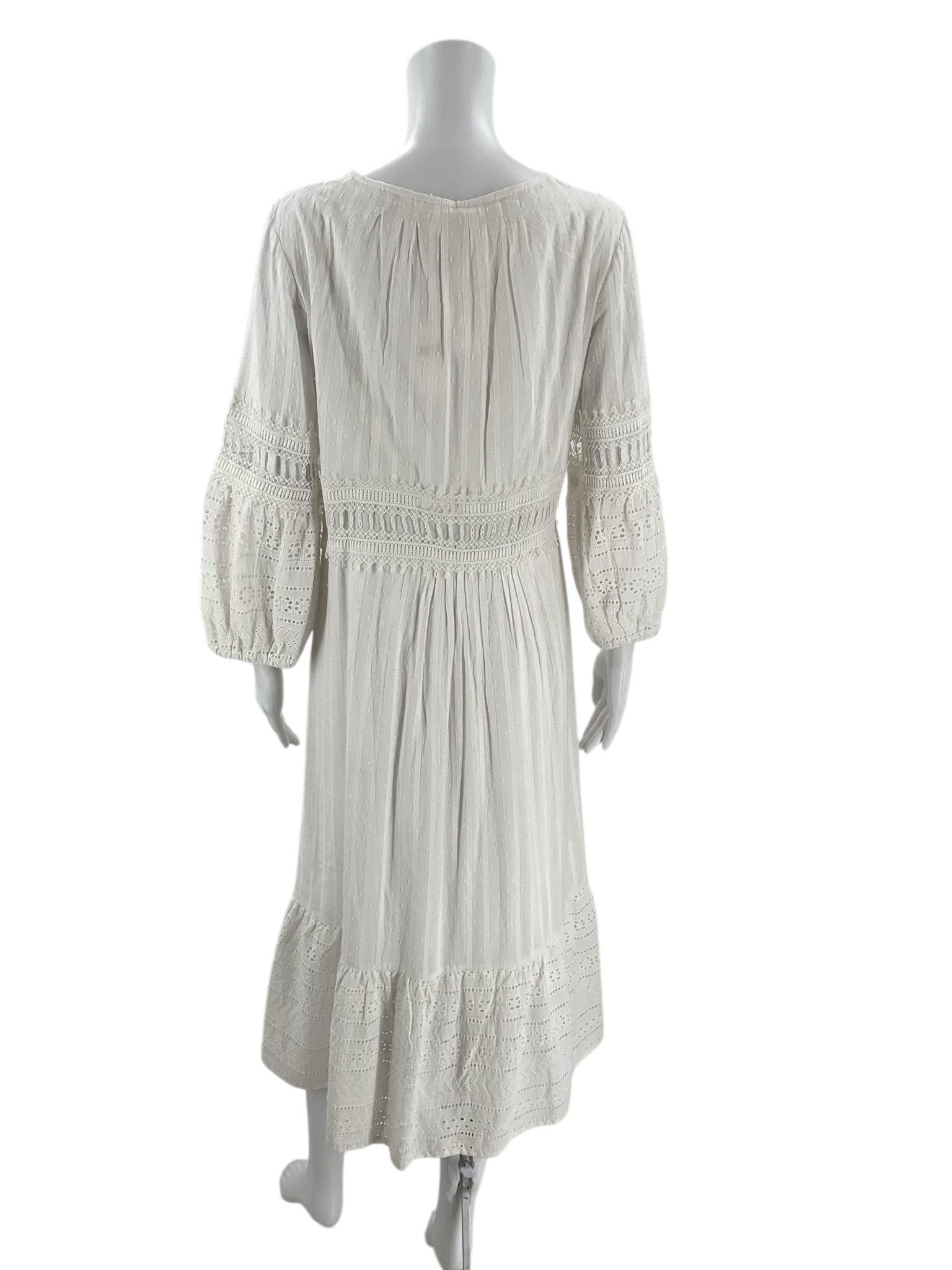 Back view of Anthropologie White Solid Maxi Dress - Size 10 showing gathered waist and lace accents, available at Margaret’s Fine Consignments.